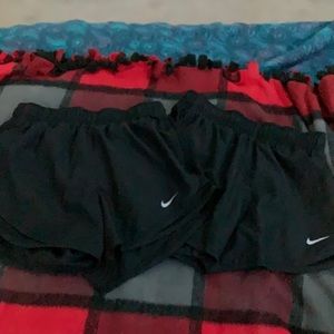 black Nike shorts, size XS
